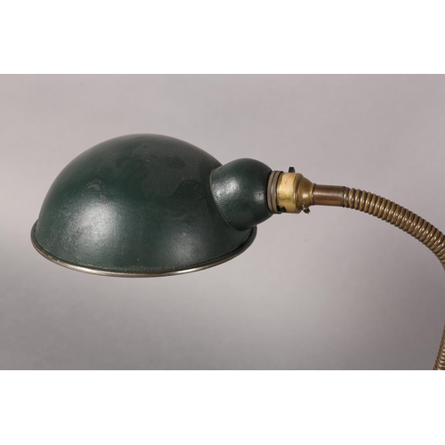 42 - A 1930s desk lamp, with green enamelled cup-shape shade, on adjustable goose neck column on domed ci... 