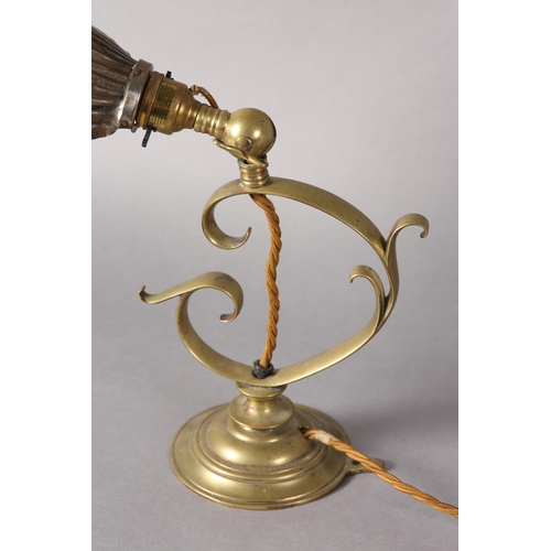 43 - An Edwardian brass desk lamp on scrolled column on a circular stepped base, with later plated on cop... 