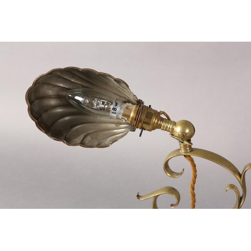 43 - An Edwardian brass desk lamp on scrolled column on a circular stepped base, with later plated on cop... 