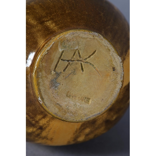 12 - Svend Hammershoi for Herman A Kahler Keramik, Denmark, a vase, ovoid, ochre and brown glaze, over ea... 