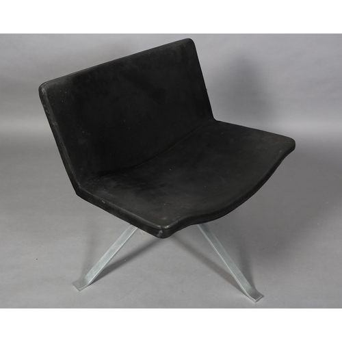 55 - A black suede swivel chair on four steel legs