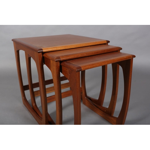 49 - A nest of three teak occasional tables by Sunelm, on square frame legs, 48cm square x 51cm high maxi... 