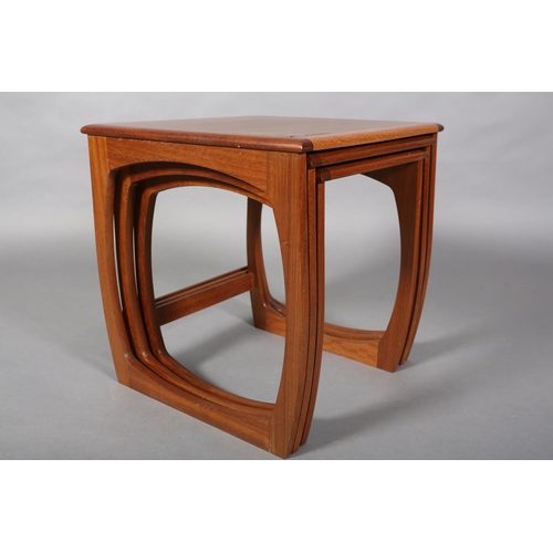 49 - A nest of three teak occasional tables by Sunelm, on square frame legs, 48cm square x 51cm high maxi... 