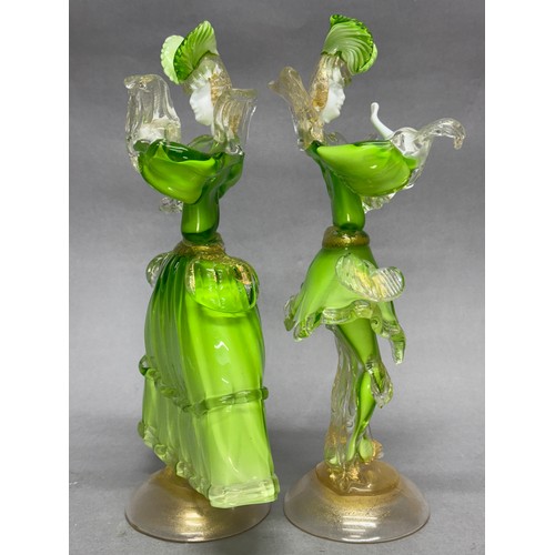 77 - A pair of Murano lime green aventurine, white and clear glass figures in elaborate costume standing ... 