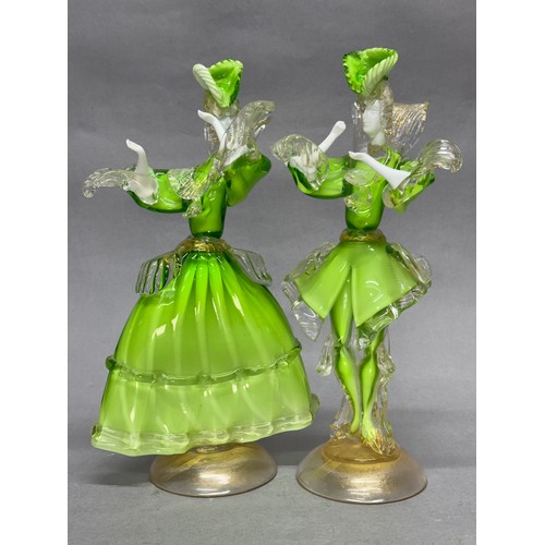 77 - A pair of Murano lime green aventurine, white and clear glass figures in elaborate costume standing ... 