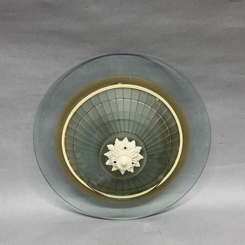 52 - A 1930s glass pendant lamp, the cream leaf cast finial holding to glass discs separated with panels ... 