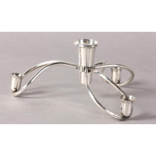 18 - Danish 1970s, A silver plate table centrepiece having three candleholders centred with a removeable ... 