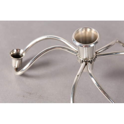 18 - Danish 1970s, A silver plate table centrepiece having three candleholders centred with a removeable ... 