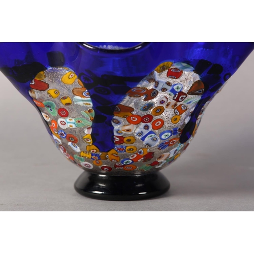 17 - A Murano millefiori murrina glass vase, the folded rim with border and drips in blue glass and on bl... 