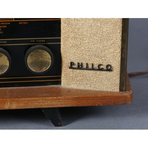 88 - A Philco radio c1958, mahogany case with pale caramel and gilt flecked cloth front, glass panel and ... 