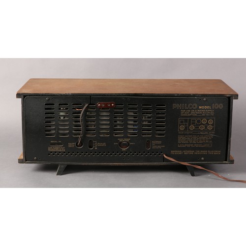 88 - A Philco radio c1958, mahogany case with pale caramel and gilt flecked cloth front, glass panel and ... 