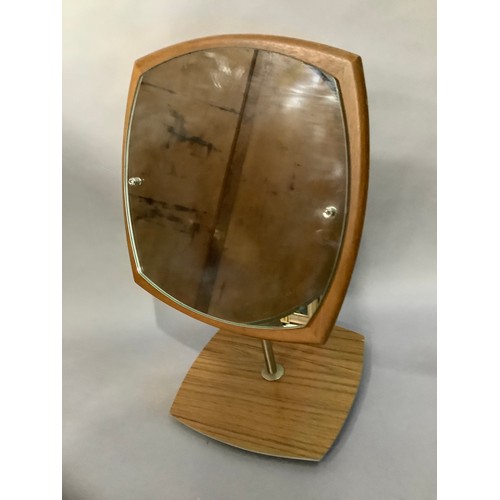 76 - A teak framed vanity mirror, c1960s, rounded square form, brushed metal column on a plinth base