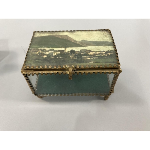 26 - Two French gilt metal an glass jewellery caskets of rectangular form each inset with colour view of ... 