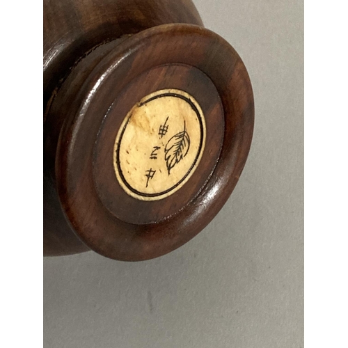 40 - A Chinese hardwood and resin inset compass, the domed cover inset with reserves of animals of the Ch... 