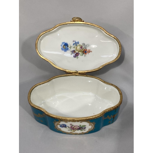 9 - A Limoges porcelain and gilt metal casket of panelled oval form, the domed cover poly-chrome enamell... 