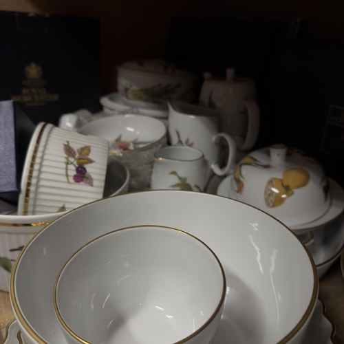 59 - An extensive Royal Worcester Evesham dinner service for eight having plates in four sizes, bowls in ... 