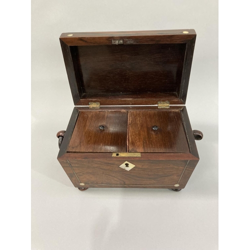 12 - A mid 19th century rosewood and mother-of-pearl inlaid sarcophagus tea caddy, the interior fitted wi... 