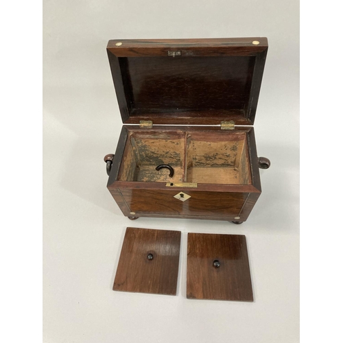 12 - A mid 19th century rosewood and mother-of-pearl inlaid sarcophagus tea caddy, the interior fitted wi... 