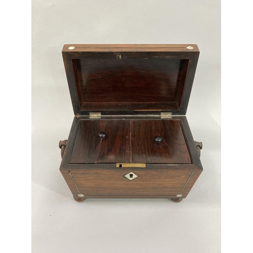 13 - A mid 19th century rosewood and mother-of-pearl inlaid sarcophagus tea caddy, the interior fitted wi... 