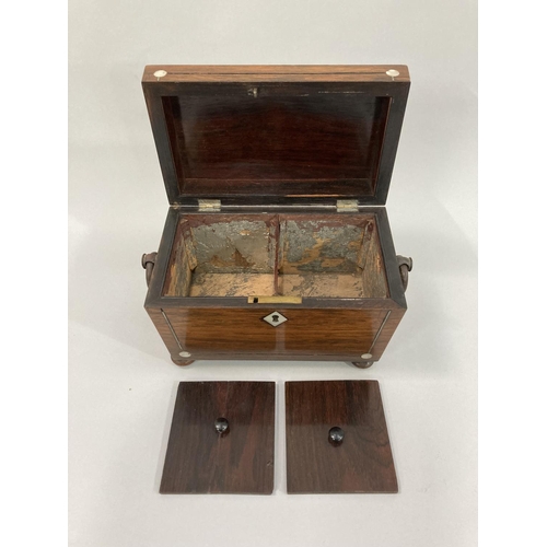 13 - A mid 19th century rosewood and mother-of-pearl inlaid sarcophagus tea caddy, the interior fitted wi... 