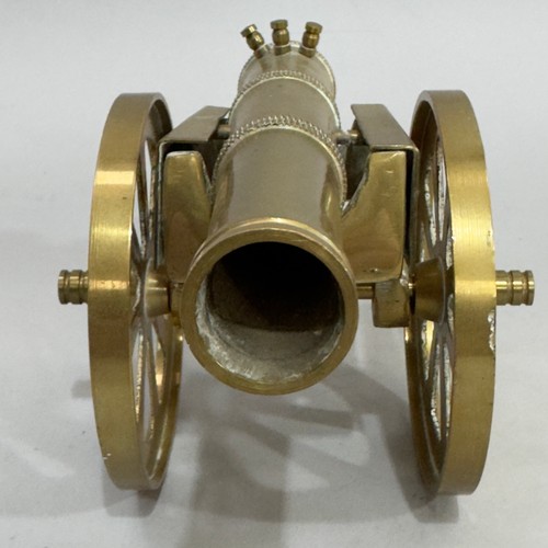 47 - A brass model of a canon on carriage, 35cm long