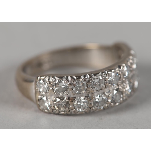 440 - A DIAMOND SET RING, the brilliant cut stone grain set in two lines in white metal (tests as 18ct gol... 