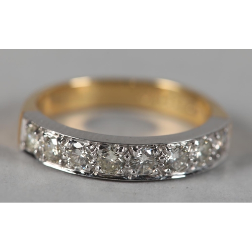 441 - A DIAMOND SET HALF HOOP RING in 18ct yellow and white gold, c2001, the brilliant cut stones grain se... 