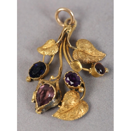 429 - A 19TH CENTURY AMETHYST AND PASTE PENDANT in 14ct gold, the oval and pear shaped stones set in close... 