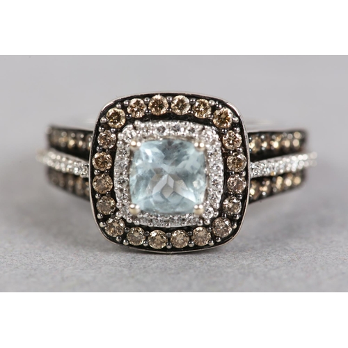 434 - AN AQUAMARINE AND DIAMOND CLUSTER RING in 14ct white gold by Le Vian, the cushion faceted aquamarine... 