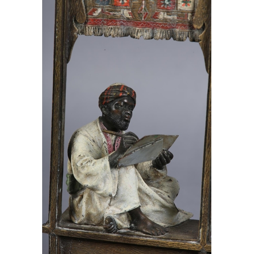 66 - FRANZ XAVIER BERGMAN (Austrian 1861-1936), Cold painted bronze inkwell cast as an Arab scribe sittin... 