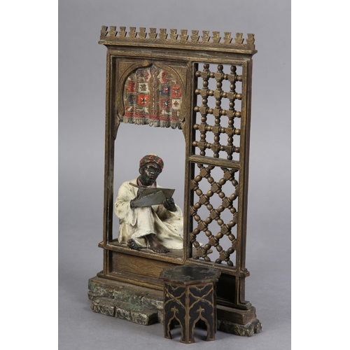 66 - FRANZ XAVIER BERGMAN (Austrian 1861-1936), Cold painted bronze inkwell cast as an Arab scribe sittin... 