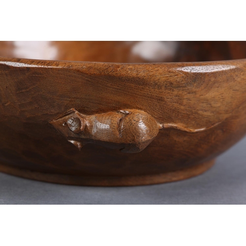 494 - THOMPSON OF KILBURN 'MOUSEMAN', An early oak fruit bowl, circular, the exterior carved in relief wit... 