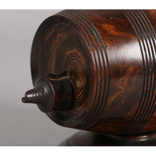 73 - A 19TH CENTURY LIGNUM VITAE STRING BARREL, on circular base, 10.5cm wide x 9cm high