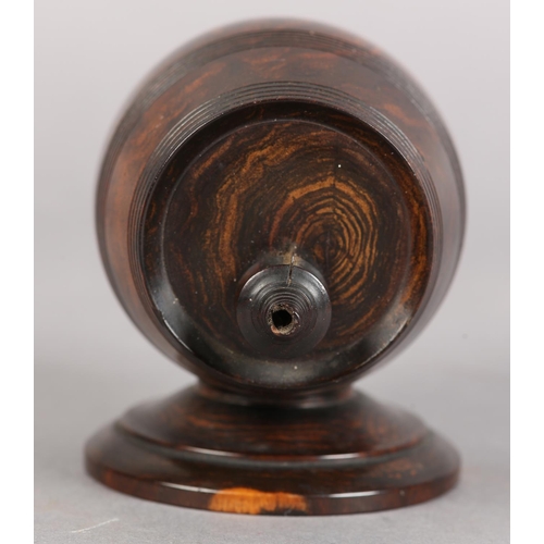 73 - A 19TH CENTURY LIGNUM VITAE STRING BARREL, on circular base, 10.5cm wide x 9cm high