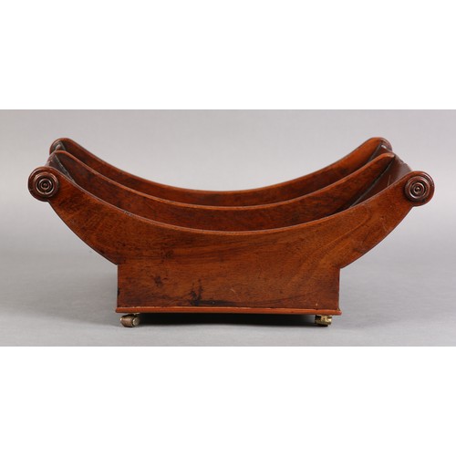 72 - A GEORGE III MAHOGANY CHEESE COASTER, of typical boat form, divided interior, on four leather bound ... 