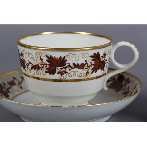 83 - A WORCESTER BARR PORCELAIN TRIO 1792-1807 of tea cup, coffee can and saucer, painted in brown with t... 