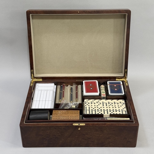 78 - A GAMES COMPENDIUM BY HILLWOOD OF LONDON, the walnut case having a lift out tray, games board inlaid... 