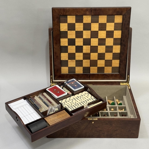 78 - A GAMES COMPENDIUM BY HILLWOOD OF LONDON, the walnut case having a lift out tray, games board inlaid... 