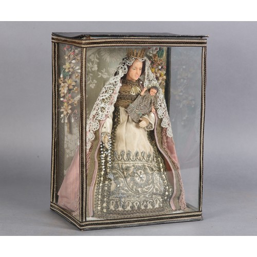 79 - AN ITALIAN WAX FIGURE OF THE MADONNA AND CHILD, late 19th/early 20th century, in glazed case, 32cm h... 