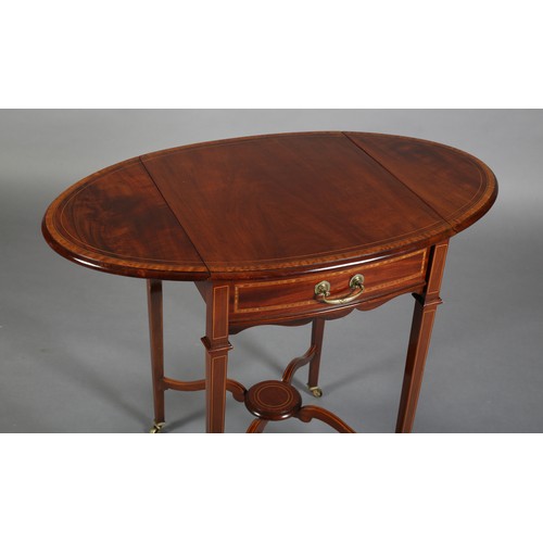 502 - AN EDWARD VII MAHOGANY AND SATINWOOD BANDED PEMBROKE TABLE, having twin oval drop leaves, drawer to ... 