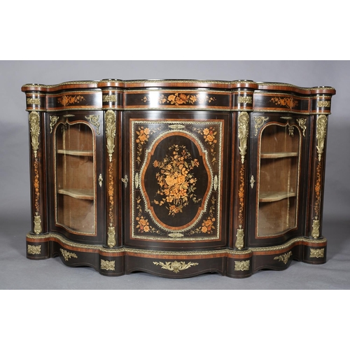 296 - A MID 19TH CENTURY WALNUT AND EBONY GILT MOUNTED CREDENZA OR SIDE CABINET, of bow fronted outline, i...
