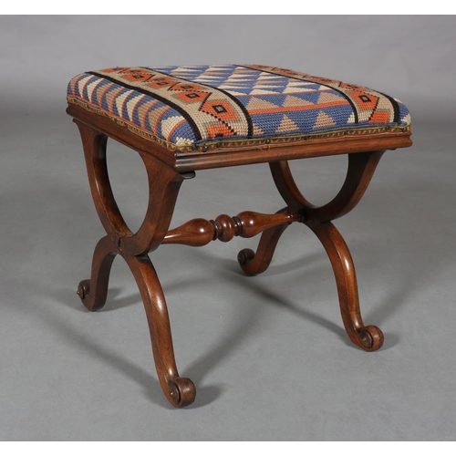298 - A VICTORIAN MAHOGANY STOOL, on 'X' frame legs joined by a turned stretcher, later cross-stitch cover... 