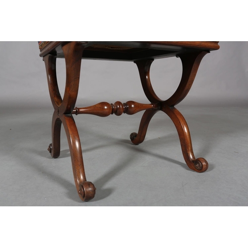 298 - A VICTORIAN MAHOGANY STOOL, on 'X' frame legs joined by a turned stretcher, later cross-stitch cover... 