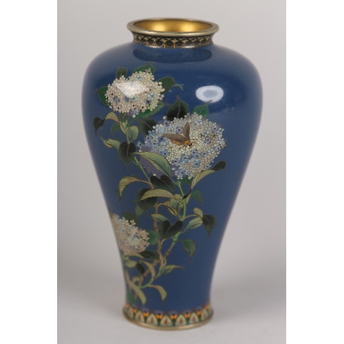 92 - A JAPANESE CLOISONNE VASE, Meiji period, the inverted baluster body with flowering branches of hydra...