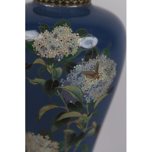92 - A JAPANESE CLOISONNE VASE, Meiji period, the inverted baluster body with flowering branches of hydra... 