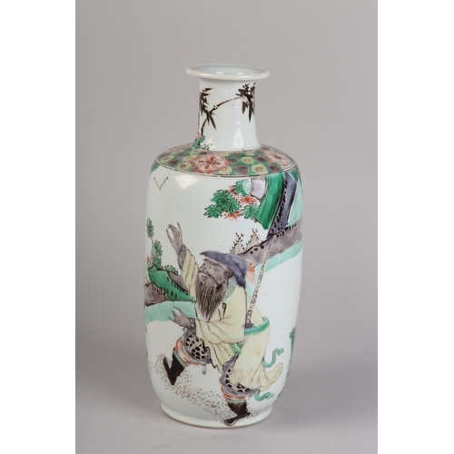 85 - A CHINESE FAMILLE VERTE ROLEAU VASE, 19th century enamelled with an ebullient bearded figure, in a l...