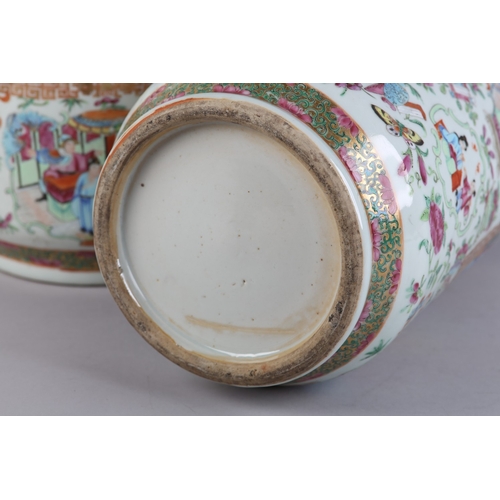 83 - A PAIR OF MID 19TH CENTURY CHINESE FAMILLE ROSE VASES, the shouldered body and ring moulded neck ena... 