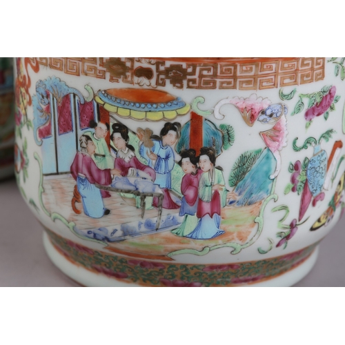 83 - A PAIR OF MID 19TH CENTURY CHINESE FAMILLE ROSE VASES, the shouldered body and ring moulded neck ena... 