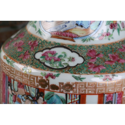 83 - A PAIR OF MID 19TH CENTURY CHINESE FAMILLE ROSE VASES, the shouldered body and ring moulded neck ena... 