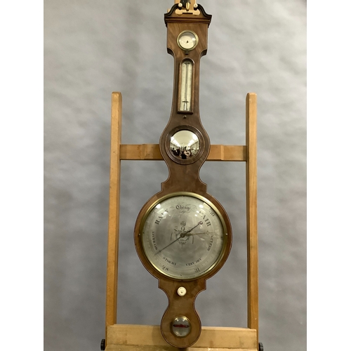 56 - AN EARLY 19TH CENTURY MAHOGANY BANJO BAROMETER-THERMOMETER, having a broken arch pediment with gilt ... 